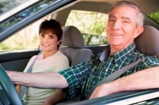 Senior Safety Two seniors in a car smiling